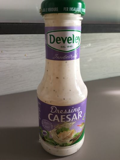 Dressing Caesar Salad