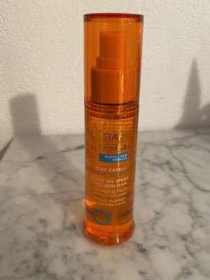 Protezione colore olio spray capelli